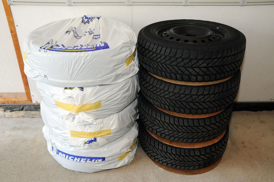 tires stacked on top of each other for winter tire storage